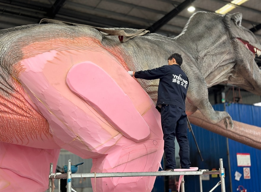 Use an electric soldering iron to create the texture of the dinosaur's skin.JPG