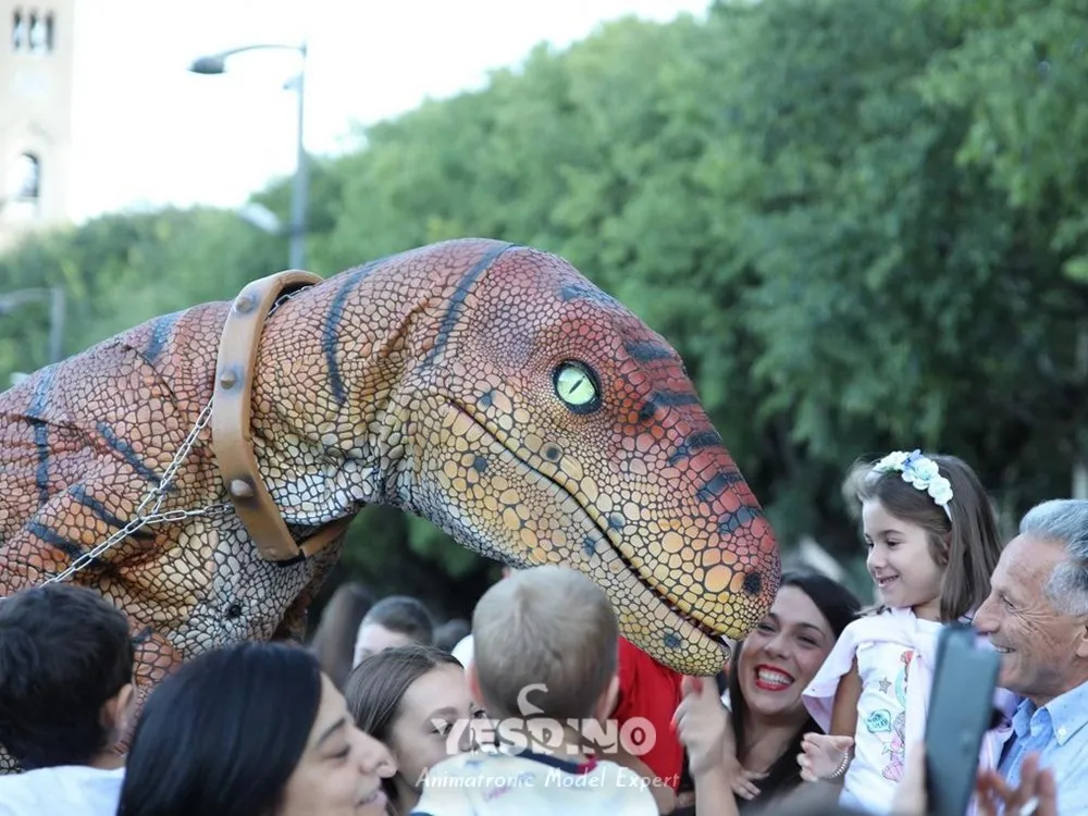 Performer wearing dinosaur costume doing street performance.webp