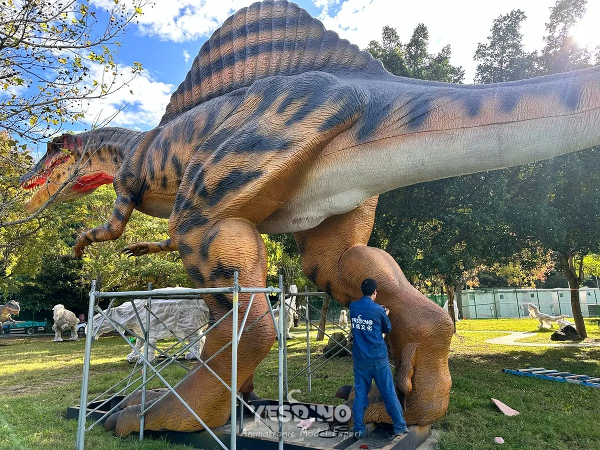 Stitching work on legs of 15‑meter animatronic Spinosaurus Stitching work on legs of 15‑meter animatronic Spinosaurus